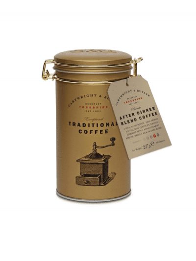 gold coffee tin with ground coffee blend