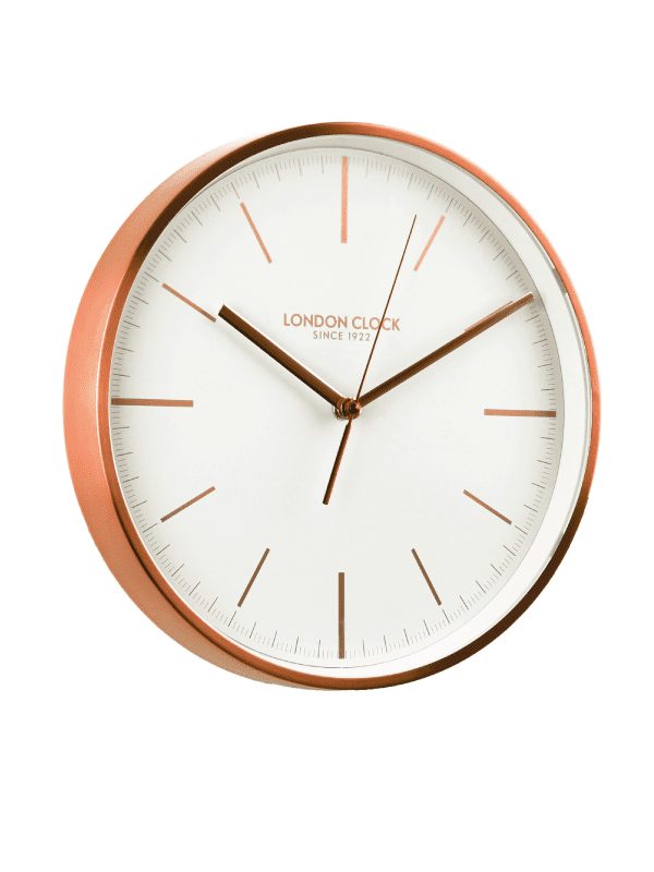 copper clock with white dial and copper hands