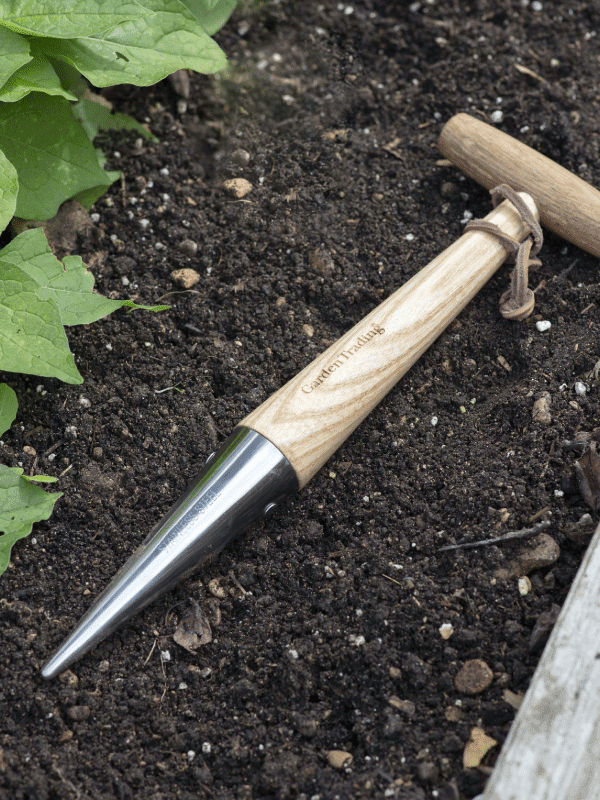 Garden Trading Dibber in a soil garden bed