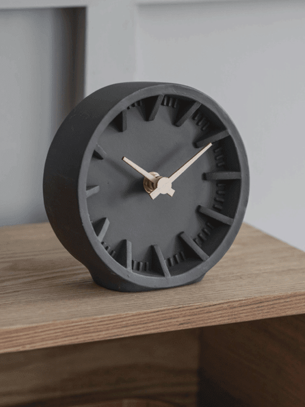 Garden Trading black Desk Clock on wooden table in a home office