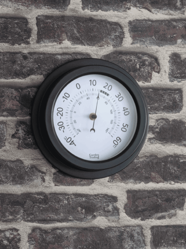 Garden Trading Thermometer on a brick wall in a garden space