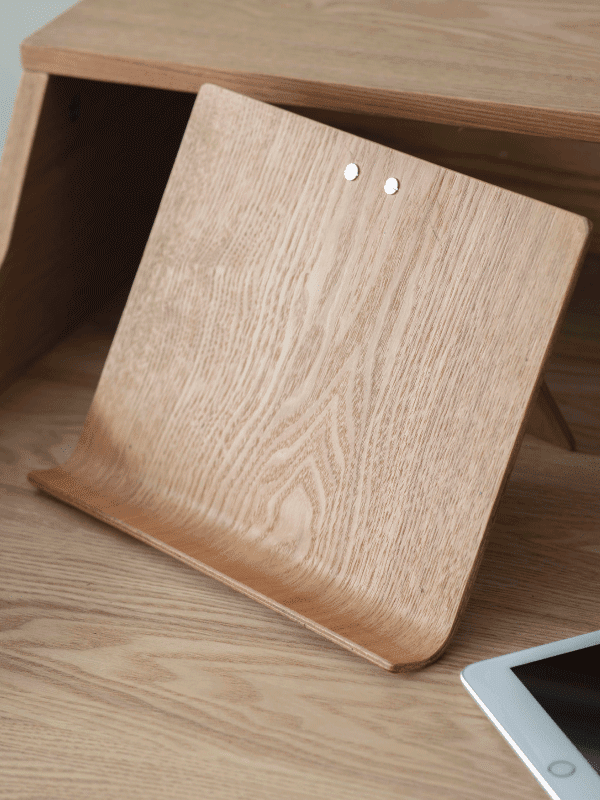 garden trading wooden tablet stand on a wooden desk in a living space