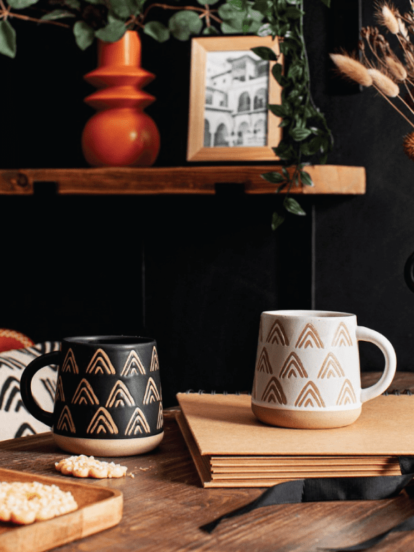 black triangle mug sat on a table