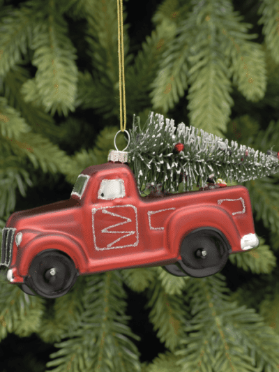 festive red glass truck with tree