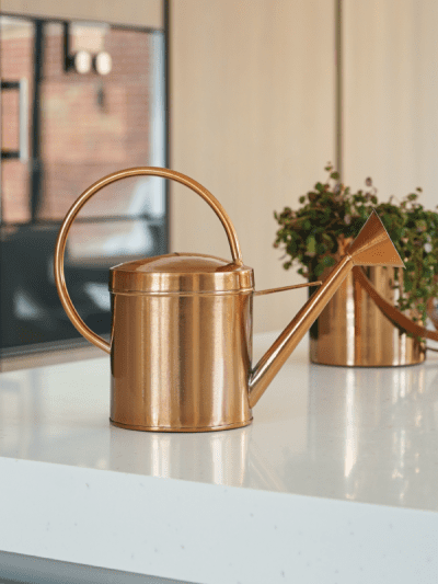 large copper indoor watering can