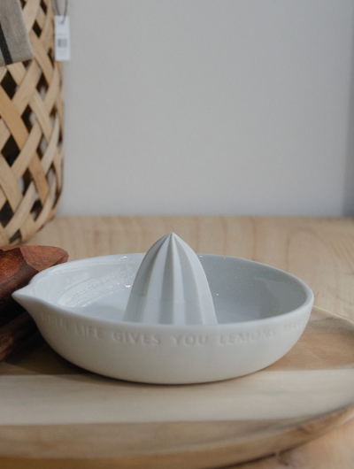 Lemon-shaped porcelain citrus squeezer by Räder Design with “When life gives you lemons, make lemonade” engraved