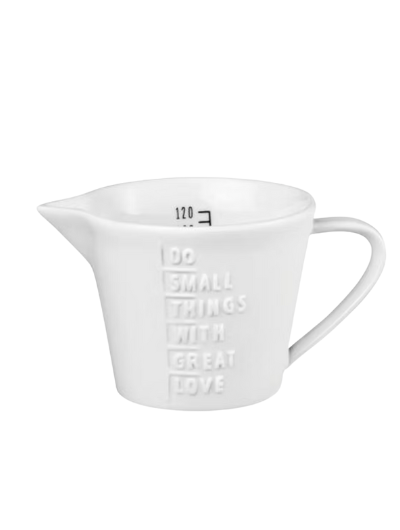 Small white porcelain measuring jug by Räder Design, 120 ml capacity, perfect for minimalist kitchens and accurate measuring.