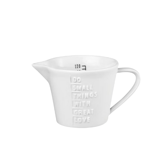 Small white porcelain measuring jug by Räder Design, 120 ml capacity, perfect for minimalist kitchens and accurate measuring.