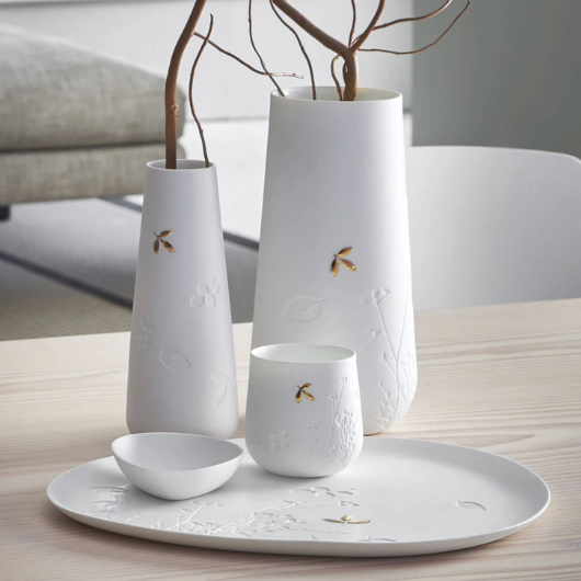 Porcelain Stories Leaf Tealight Holder with embossed twigs and gold leaf accent.
