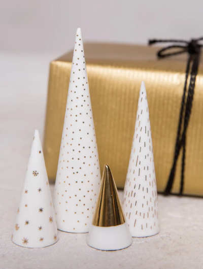 Räder white porcelain tree cone decorations with gold detailing in assorted sizes.