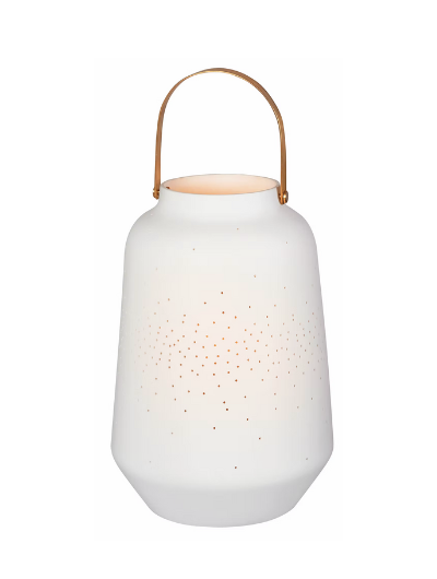 Small white porcelain lantern by Räder Design with dotted perforations and a brass handle, inspired by Japanese paper lanterns.