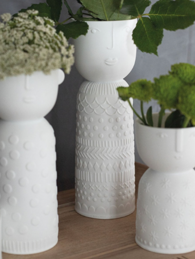 Porcelain Natural Forms Vases by Indigo Ruh in varying sizes, designed for flowers, plants, or tealights, each with unique sculptural shapes.