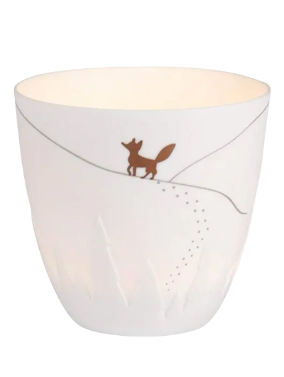 White porcelain Räder Poetrylight Fox tealight holder with golden fox and embossed trees.