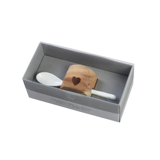 Räder Design Stories Egg Cup Set with wooden cup featuring a lasered heart and white porcelain spoon.