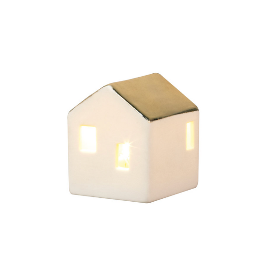 Mini porcelain LED illuminated house by Räder Design glowing softly, 4.5cm tall, battery-operated decorative light.