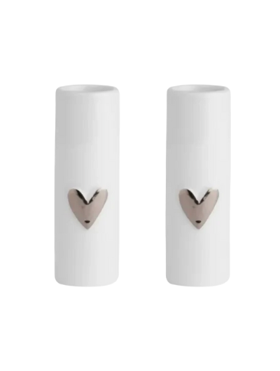 Set of small white porcelain vases by Räder with delicate gold heart detail, glazed inside and part-glazed outside, ideal for single stems.