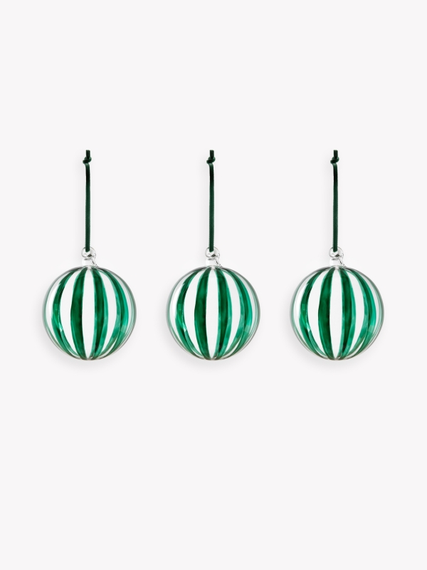 Set of three clear glass Purton Striped Christmas Baubles with hand-painted berry stripes and matching velvet ribbons, hanging on a Christmas tree.