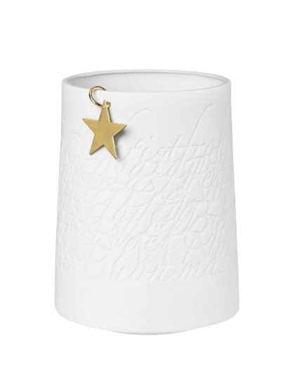 Räder large porcelain tealight holder featuring the word “Christmas” cut out in multiple languages, with a small hanging gold metal star. A beautiful decorative piece and thoughtful gift for the winter season.