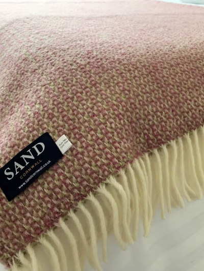 Sand Cornwall Raspberry Illusion 100% new wool blanket with cream tassels.