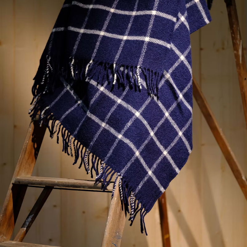 Navy chequered check pure new wool blanket throw with tasselled edge.