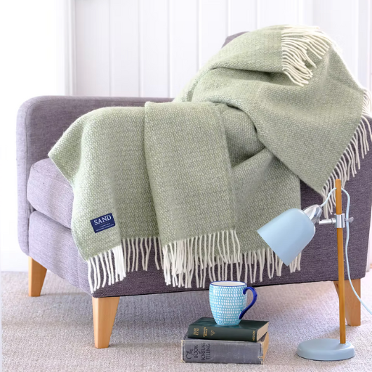 Green and grey pure new wool blanket Throw with circular weave and cream tassels, Sand Cornwall