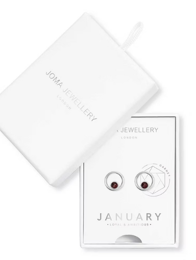 Joma Jewellery January Birthstone earrings presented in a white Treasure The Little Things gift box with garnet halo studs.