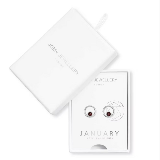 Joma Jewellery January Birthstone earrings presented in a white Treasure The Little Things gift box with garnet halo studs.