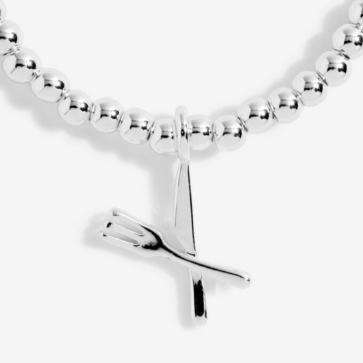 Joma Jewellery A Little Fabulous Foodie silver-plated bracelet with foodie charm on sentiment card.