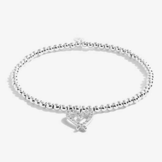 Joma Jewellery A Little Twinkling Twenty One bracelet with silver-plated heart charm on sentiment card.