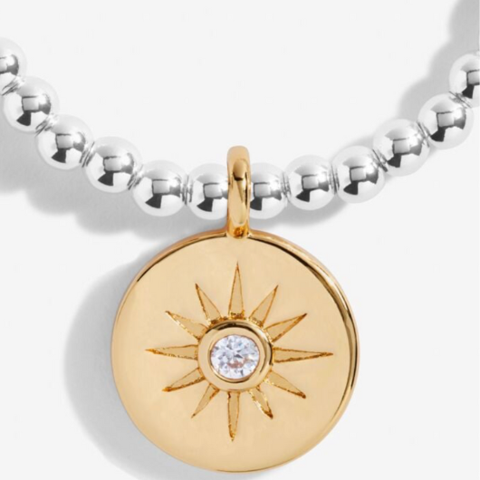 Joma Jewellery A Little You’re The Best bracelet with gold-plated charm on sentiment card.