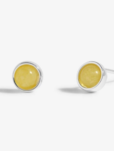 Close-up of Joma Jewellery November Birthstone Earrings with Yellow Quartz stones and traits card.