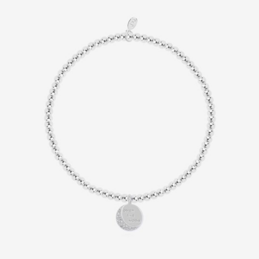 Joma Jewellery A Little Over The Moon silver-plated bracelet with celestial charm on sentiment card.