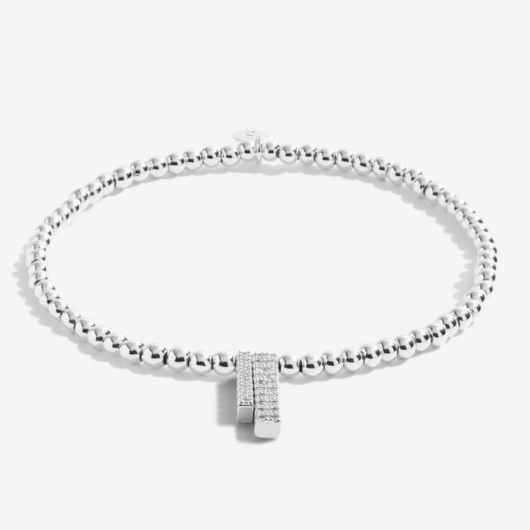 Joma Jewellery A Little Through Thick And Thin silver-plated bracelet with charm on sentiment card.
