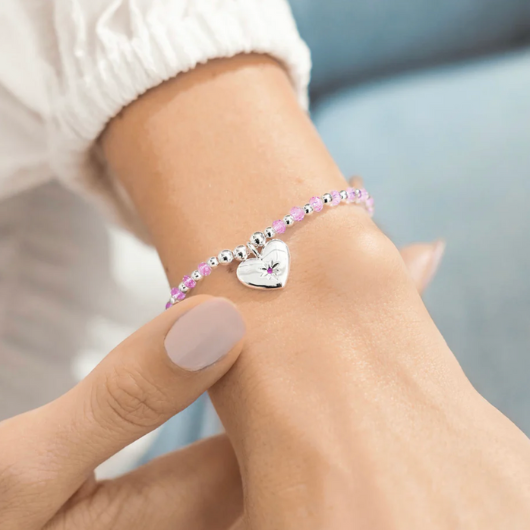 Colour Pop Birthday Girl bracelet with coloured crystal beads and silver-plated charm on sentiment card.