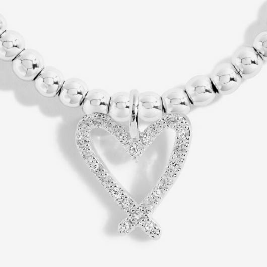 Joma Jewellery A Little Twinkling Twenty One bracelet with silver-plated heart charm on sentiment card.