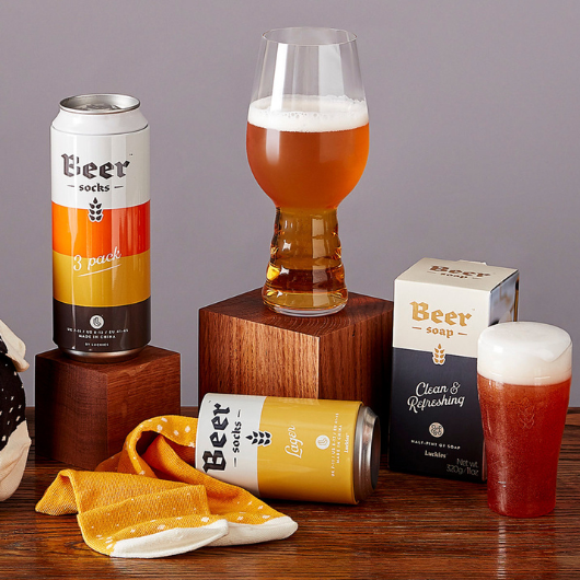 Beer Socks packaged in novelty beer cans in Ale, Lager and Stout designs.