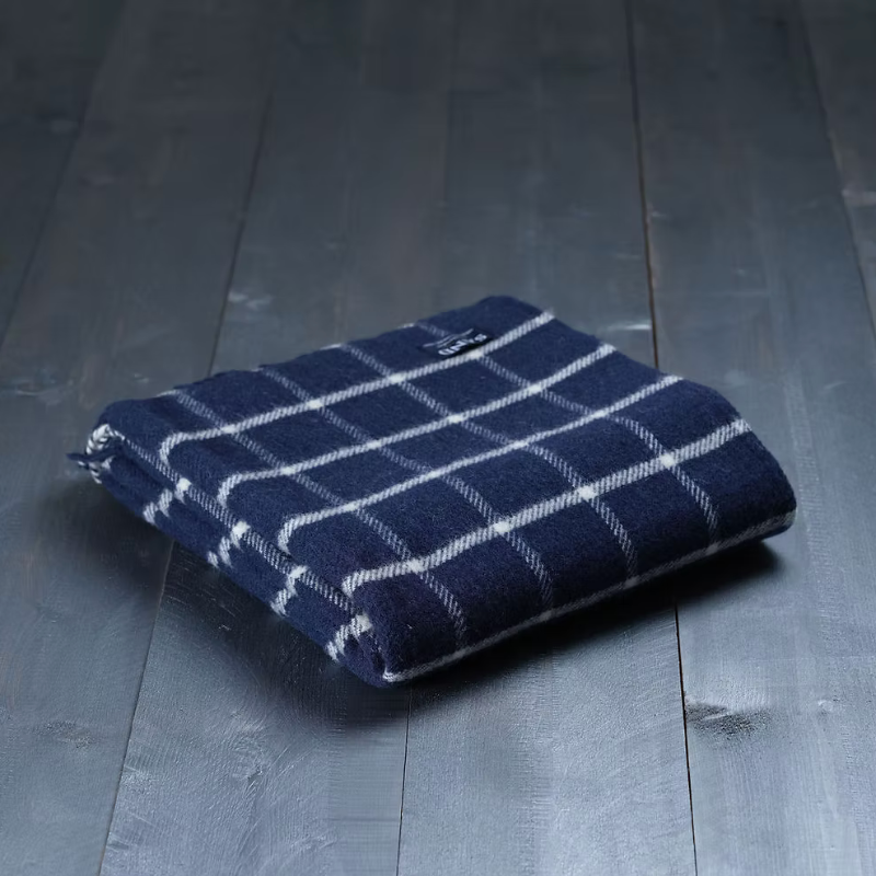 Navy chequered check pure new wool blanket throw with tasselled edge.