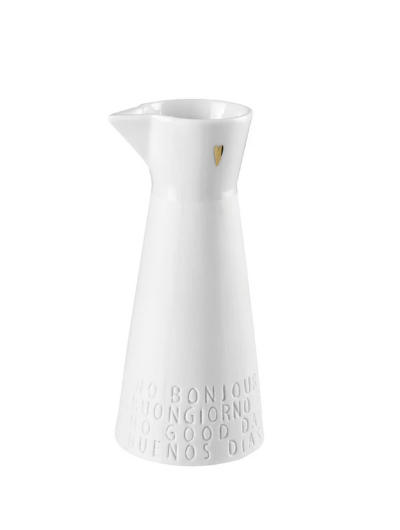 White porcelain Räder breakfast pitcher with gold detailing and etched greetings.