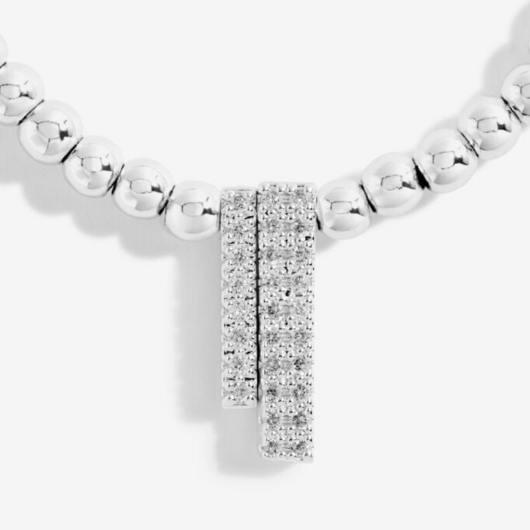 Joma Jewellery A Little Through Thick And Thin silver-plated bracelet with charm on sentiment card.