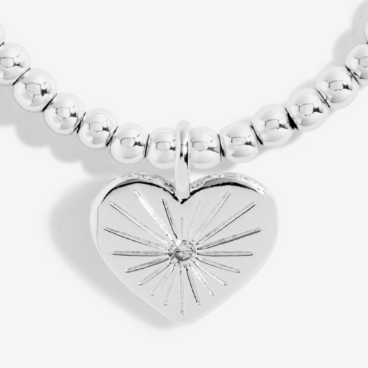 Joma Jewellery A Little Lucky To Have You silver-plated bracelet with sparkling charm on sentiment card.