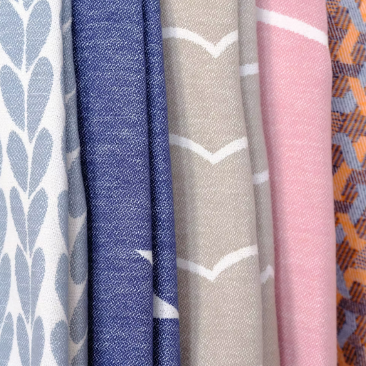 Wave mushroom organic cotton blanket throw with wave design and stitched edge,made in Britain.