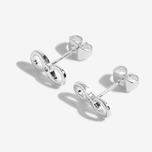 Angled view of Joma Jewellery silver-plated Forever Friends infinity earrings showing polished finish and butterfly backs.
