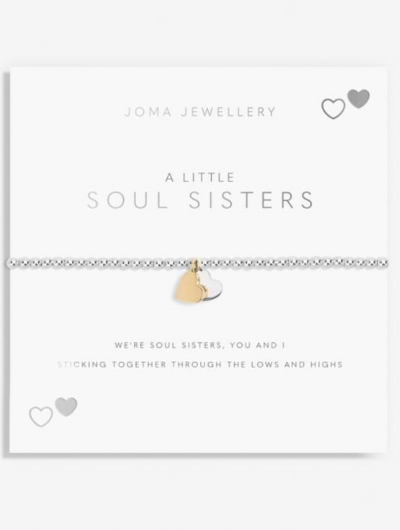 A Little Soul Sisters bracelet with silver and gold heart charms on sentiment card.