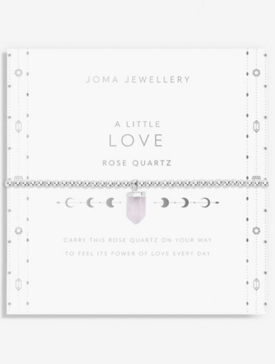 A Little Crystal Karma Howlite bracelet with silver beads and natural howlite charm on sentiment card.