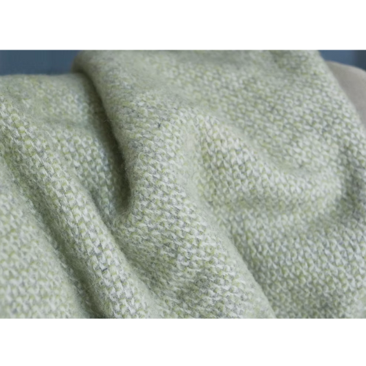 Green and grey pure new wool blanket Throw with circular weave and cream tassels, Sand Cornwall