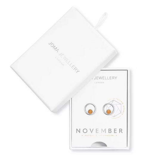 Joma Jewellery November Birthstone earrings presented in a white Treasure The Little Things gift box with yellow quartz halo studs.