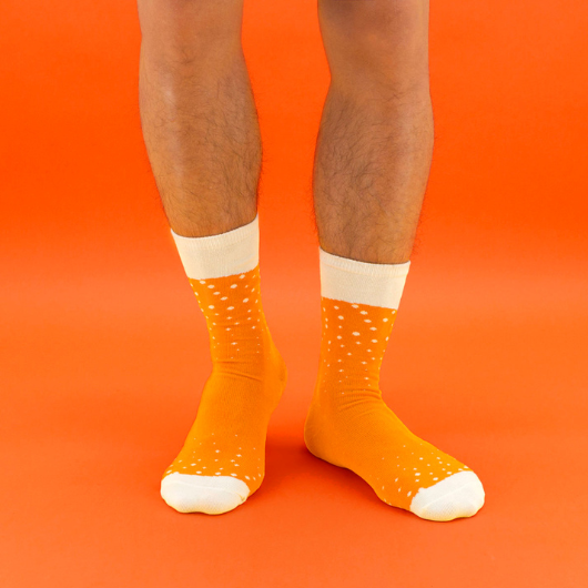 Beer Socks packaged in novelty beer cans in Ale, Lager and Stout designs.