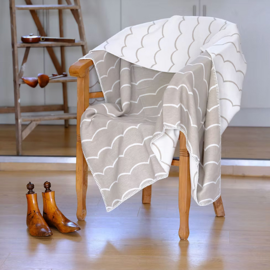 Wave mushroom organic cotton blanket throw with wave design and stitched edge,made in Britain.