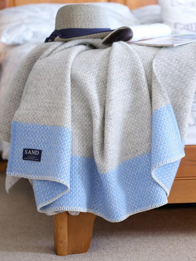 Crossweave Sea Blue Pure New Wool Blanket Throw with light grey base and bright blue stripe, folded neatly.