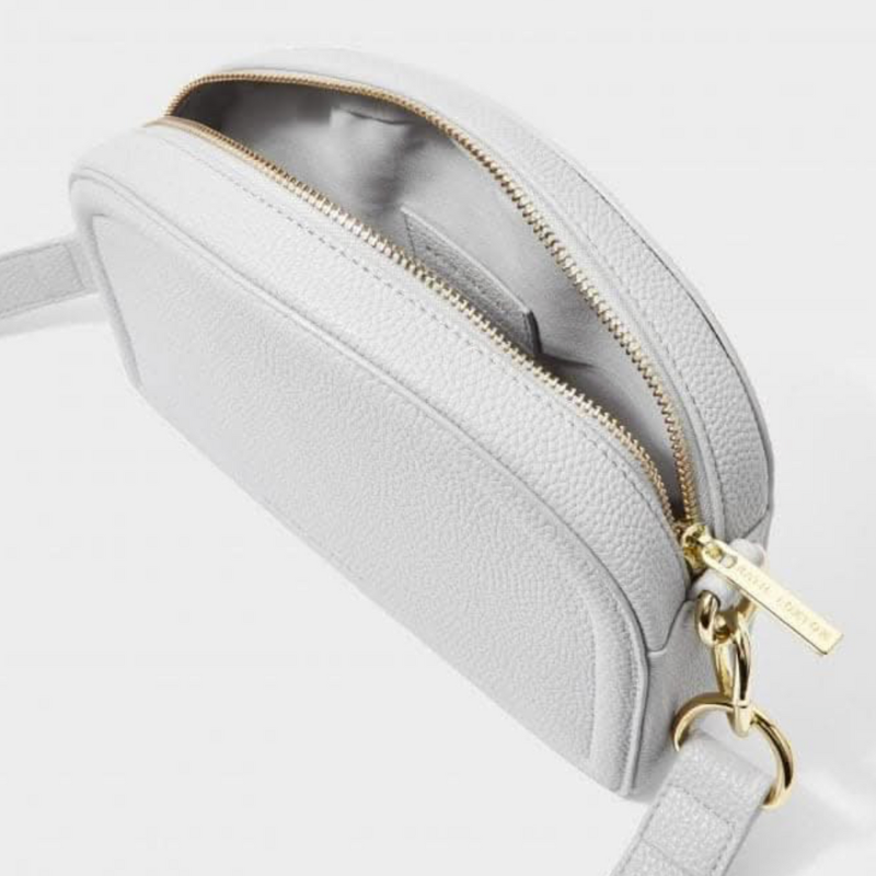 Keira Half Moon Bag in pale blue with chain-link strap detail.